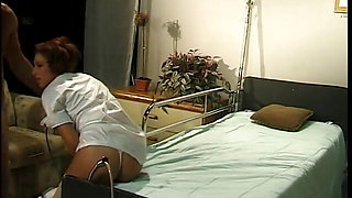Redheaded nurse spreads her legs for doctor's cock on a hospital bed
