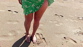 Dominant woman having fun on the beach