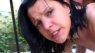 Amazing busty brunette slut doing blowjob outdoor