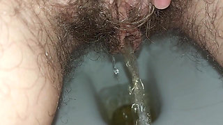 the longest trip to the bathroom, a very long piss, a hairy pussy peeing