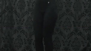 Under Nomi's Black Nike Sneakers