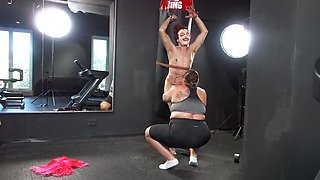 Mistress April boxing practice on tied up slave Martin
