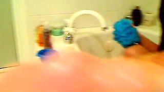 This horny amateur dirty talked teen masturbates in shower