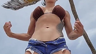 Giant Muscular Goddess on the Beach