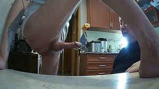 In the afternoon, I fuck my mother-in-law in the mouth in the kitchen and cum