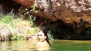 Wild girl posing naked and playing with herself outdoors