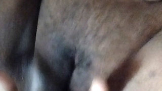 Making Auntie's pussy wet by fingering it.