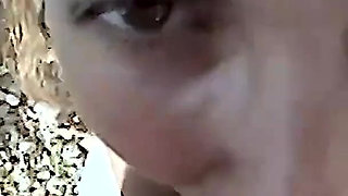 Brunette Beach Slut Shaves Her Pussy