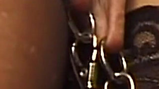 Mature MILF in Corset Gets Heavy Clamps Attached