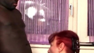 Redhead old boss is fucked by black help with a big cock in the office