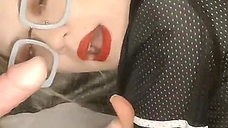 A Young Pregnant Girl in Glasses Sucks Fake Cocks