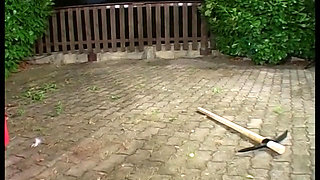 Mature and hairy woman gives a blowjob outdoor