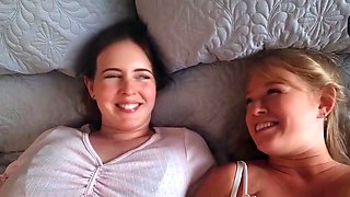 Two light-haired women play with sole fetish toys