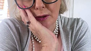 Mature blonde granny loves to masturbate her puss