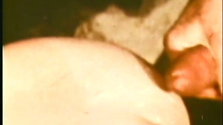 Vintage busty beauty rides a big cock