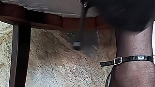 In Front of You the Secretary with Pantyhose and Stiletto Heels Dangling From Her Feet