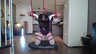 Mz31 - a Girl Tied and Suspended by a Red Rope Reaches Orgasm.