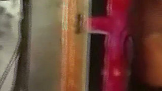 Brunette Dominatrix Teases Her Masked Caged Slave