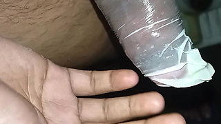 Jerking Off With Condom On Massive Cumshot Filling It Up