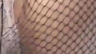 Spanking Leads to a Cumshot on Her Fishnets Ass