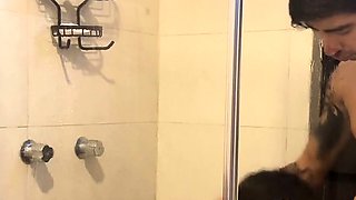 I take a bath with my friend's slut and she sucks me until
