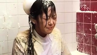 Asian girl gets a piss bukkake