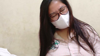 A beautiful female college student is on school break.