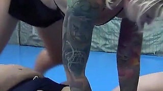 Two Tattooed Chicks Tickling Their Slave in the Gym
