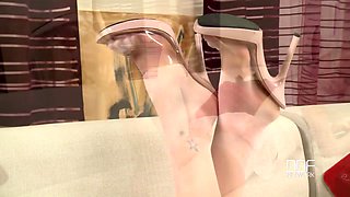 Pretty blonde stretches her legs