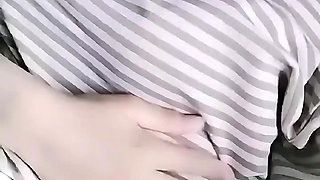 Turkish girl with headscarf who turns on the camera and puts on a show at the construction site