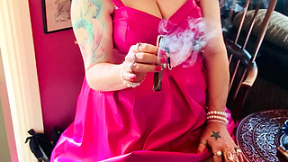 Pink To Make The Boys Wink! Tina Snua In A Leather Dress Smoking A Cigar
