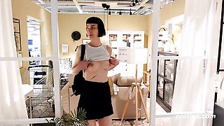 Delfine rubs herself in the middle of a store