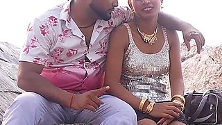 Couple Enjoy in River and Mountain