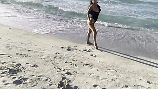 Sexy Monika Fox in Black Bodysuit on Beach