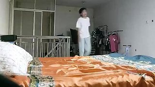 Cute amateur asian web cam girl playing with her toy