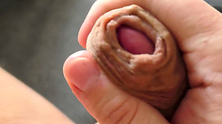 Jerk off foreskin until it's wet