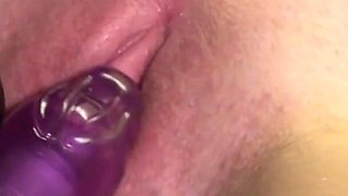 Latex Danielle in latex mask plays with purple bunny rabbit