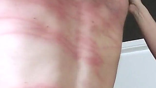 Whipped by the Topless Dominatrix