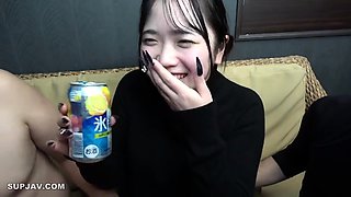 Cute outfit on Japanese teen taking a toy