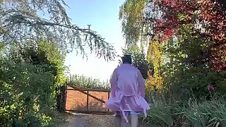 Dressed in a nightgown and robe for a morning