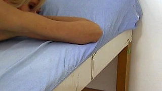 Gyno examination of blonde mature woman