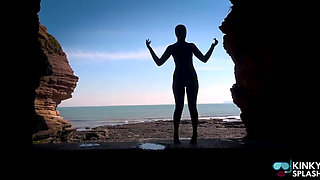 Shiny Rubber Wetsuit Tease in Private Cave