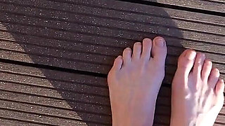Walking with My Feet on the Grass and Showing Them to You up Close