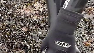 Rubbery Beach Encounter: Lucy's Neoprene Pussy Play with Stranger