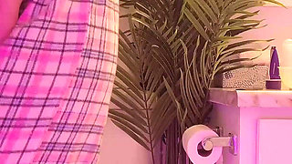 Emily pissing in the bathroom