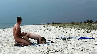 Amateur Nudist MILF Has Doggy-Style Fun at the Beach