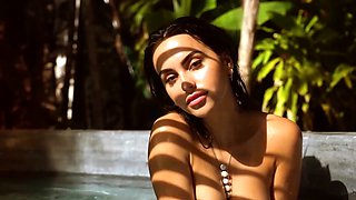 Hot latina teen posing naked in the pool