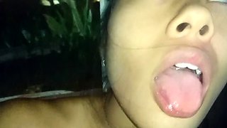 Tiny-titted Asian babe plays with herself outdoors