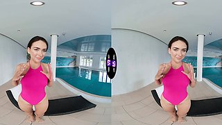 Glam teen Vixi Rafi poses by the pool in lingerie