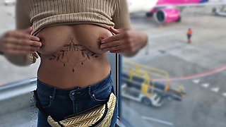 Flashing Her Tits in at the Airport, Showing Her Tits to Everyone